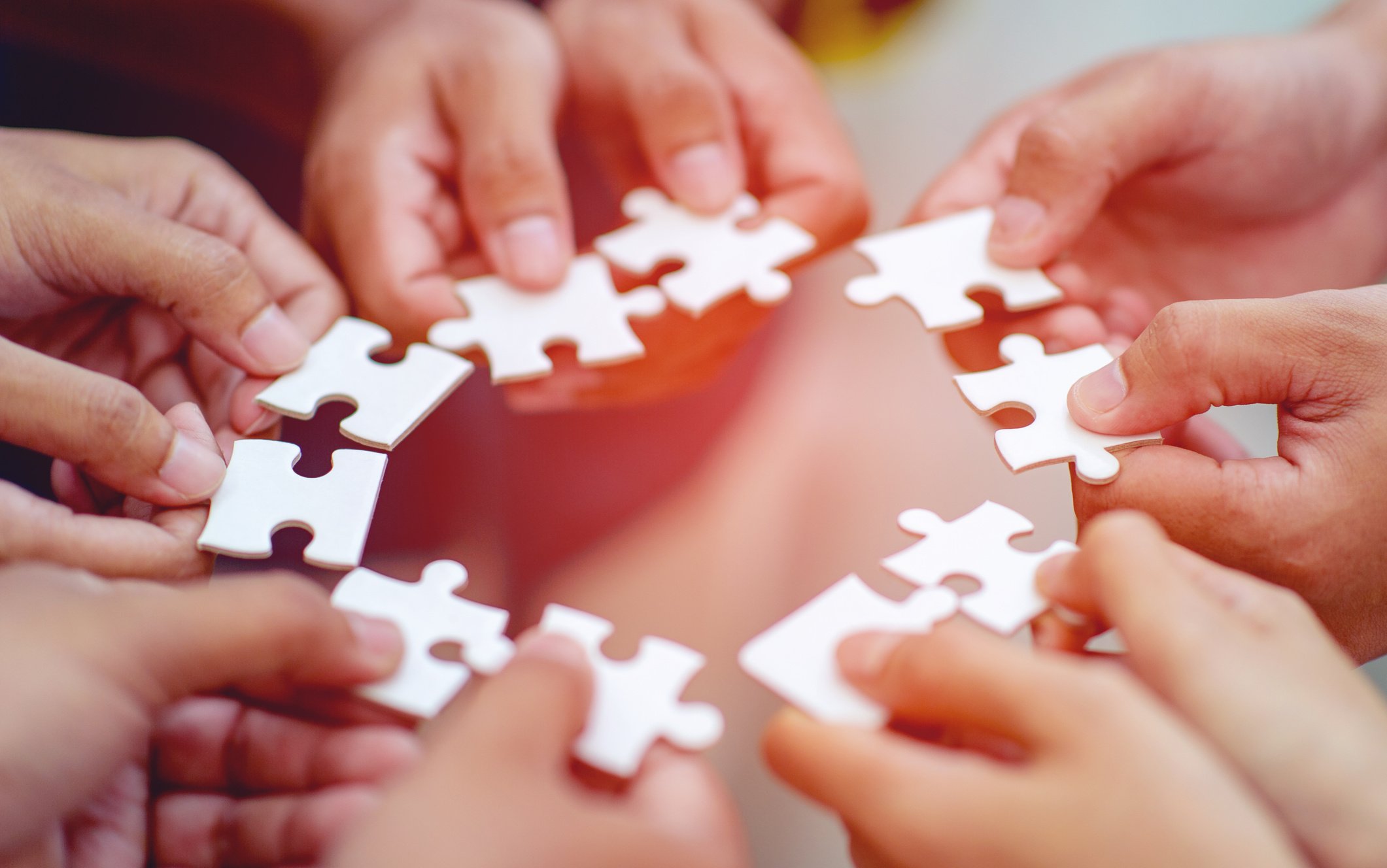 Team work, hands and jig Saw Unite with power Is a good team of successful people Team work concept